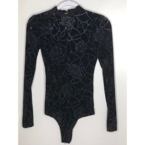 Black floral bodysuit.